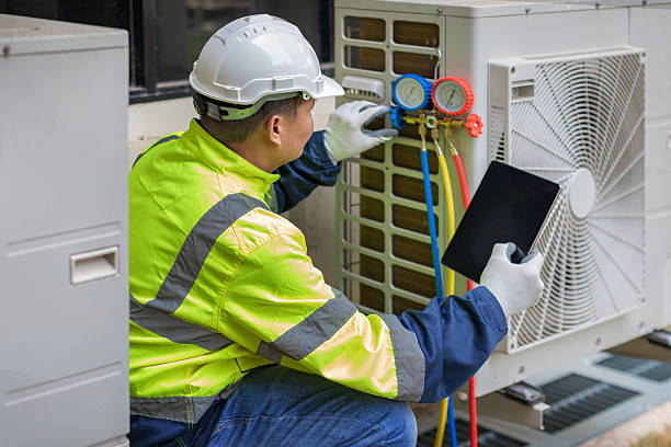 Professional Heat Pump Repair technician working in Fayette, NY
